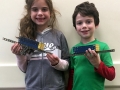 Filip and Talida show off their Erector models